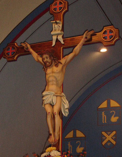 The crucifix above the rood screen at St. Hugh is one of the most beautiful statues in the church
